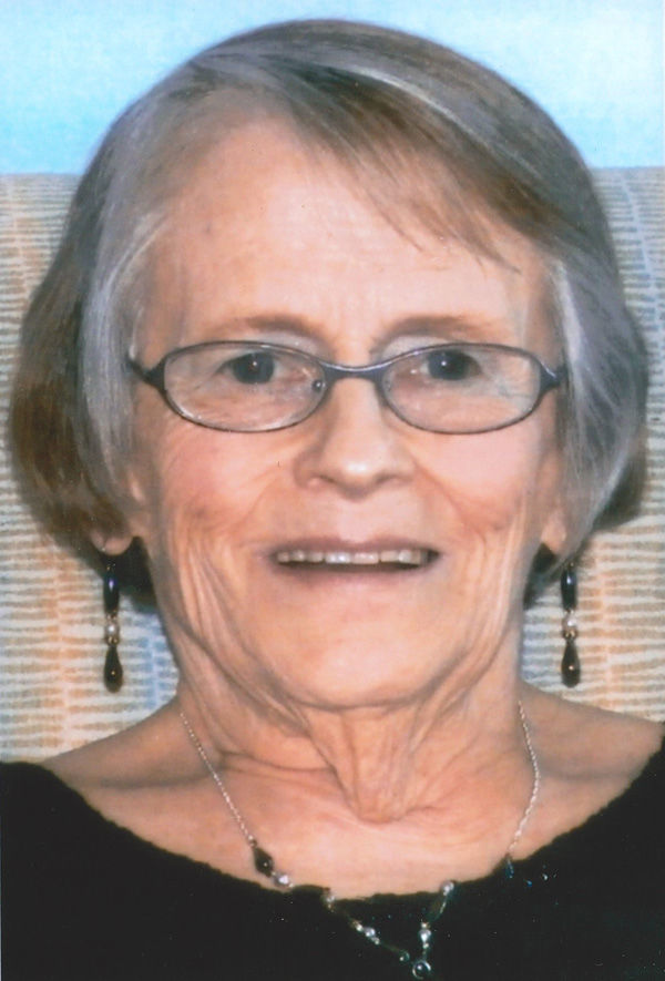 Joan M. Hughson